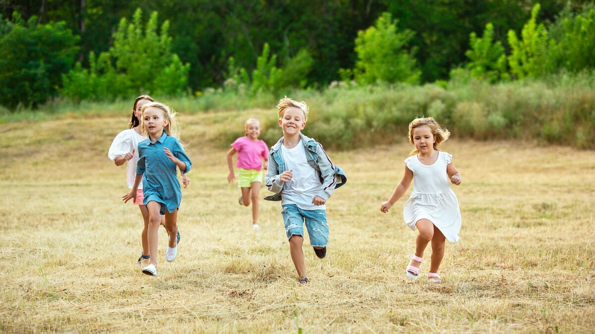 kids children running meadow summer s sunlight