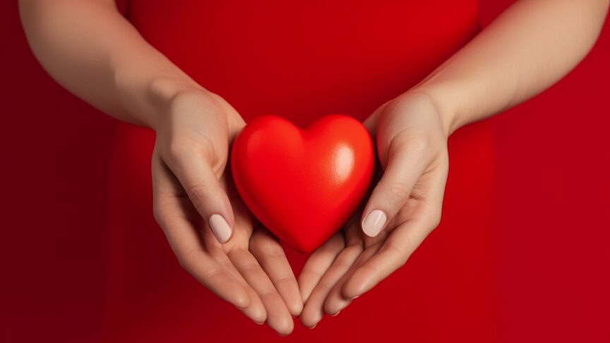 woman holding heart shaped object